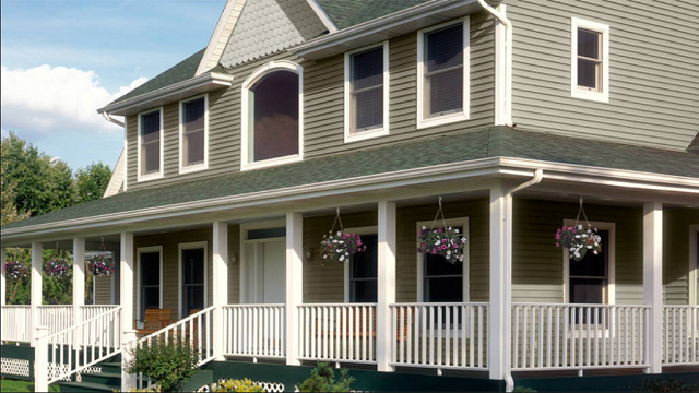 How does siding material impact the energy efficiency of a home
